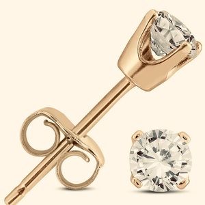 See Photos. Brand New. Pair diamond  stud .40
